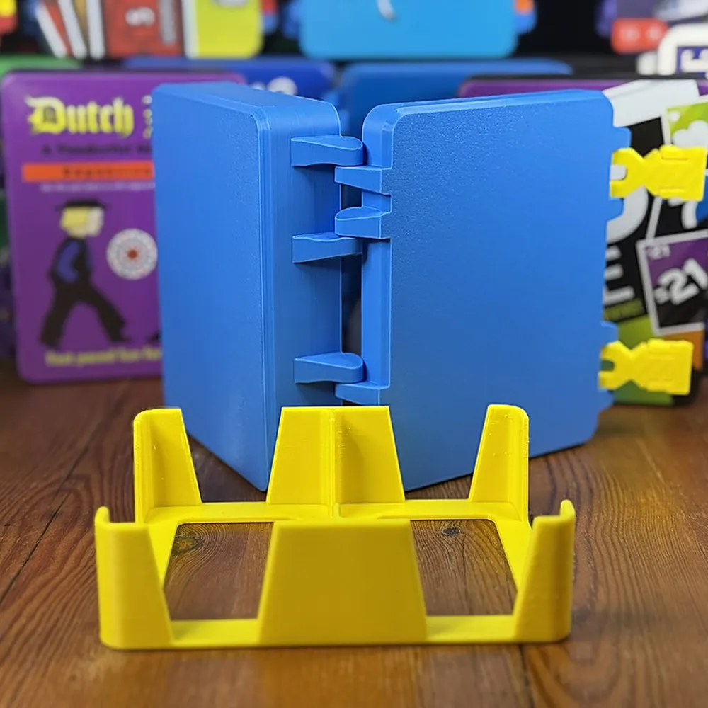 a blue case standing open on its yellow card tray