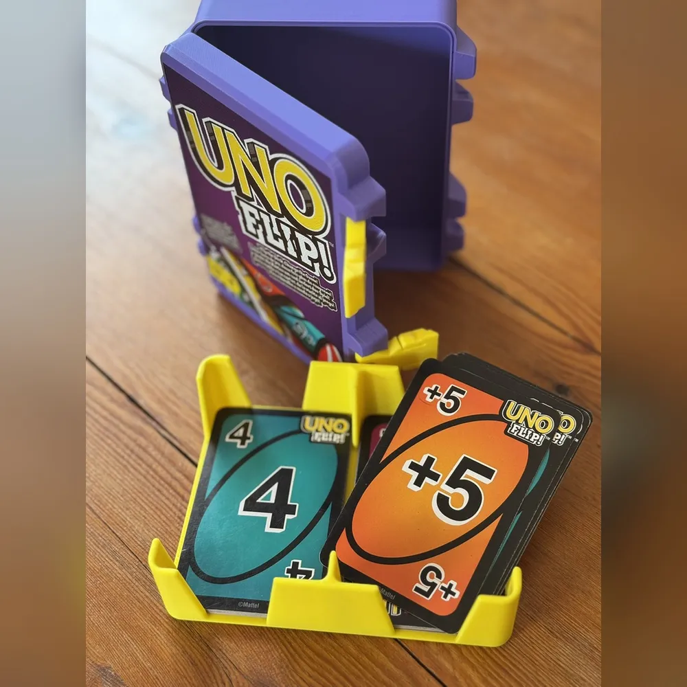 an open case with two piles of cards in its tray