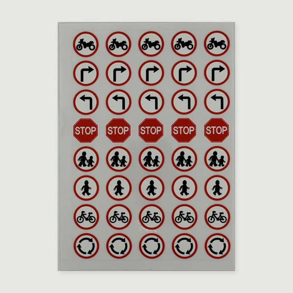 a sheet of tiny road-sign stickers